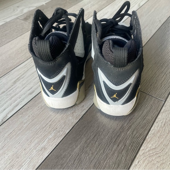 Jordan Kids Black and White Sneakers with Gold Accents - Picture 4 of 7